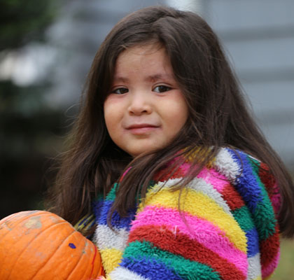 girl with rainbow jacket