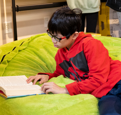 Boy reading book