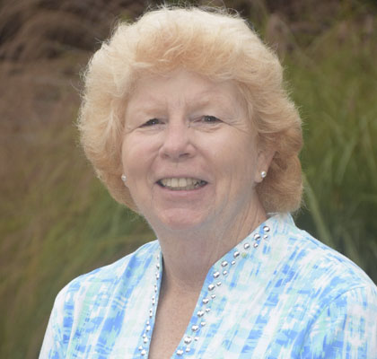 Woman in light blue shirt
