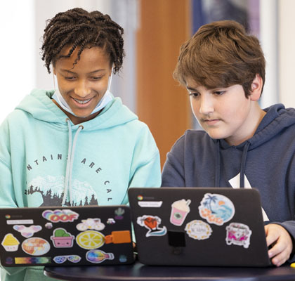 Girl and Boy with computers