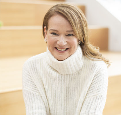 Woman sitting on stairs