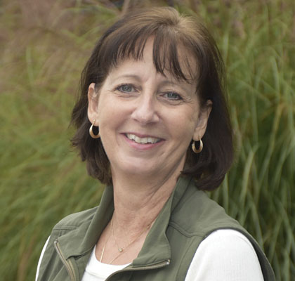 Woman in green vest