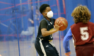 boy playing basketball 