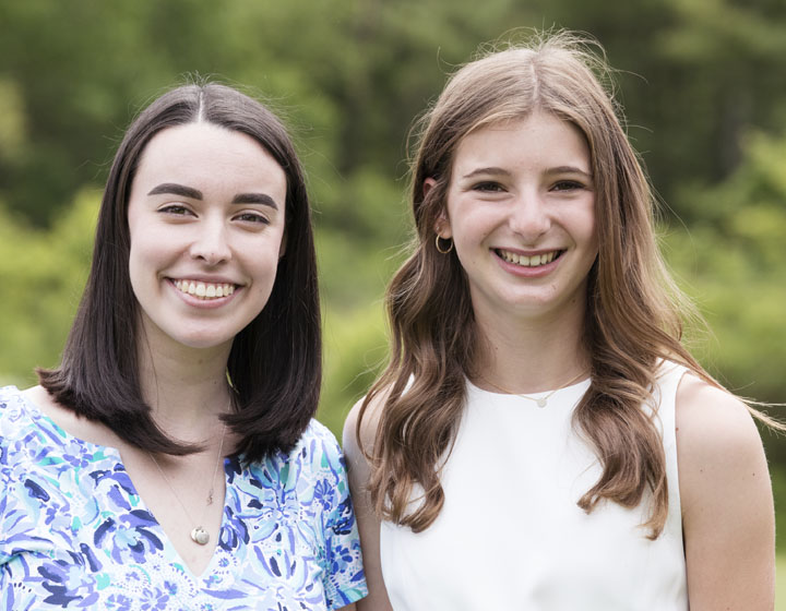 Two girls smiling