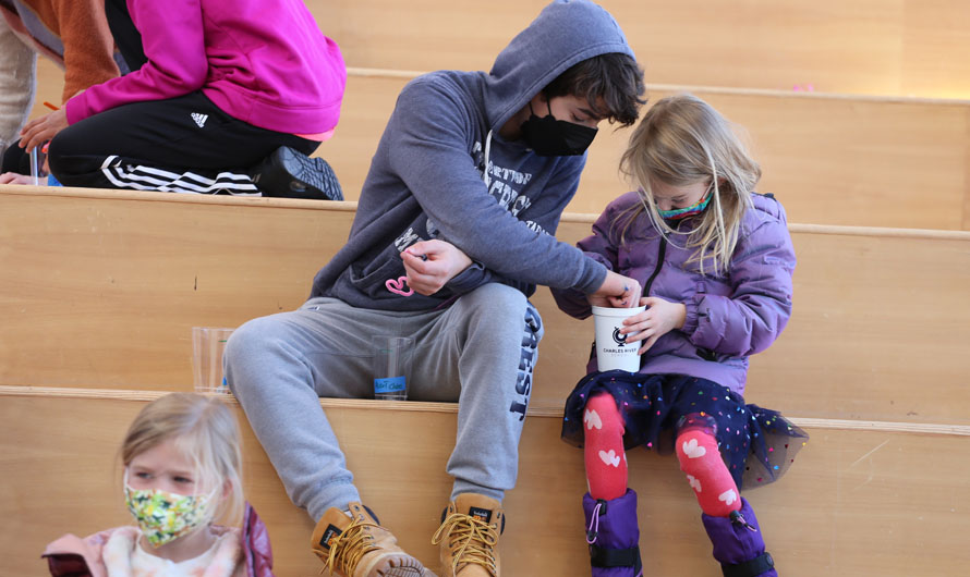 boy and girl sitting in stairs