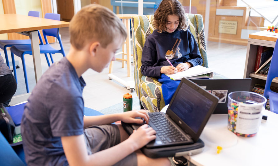 two boys on computers