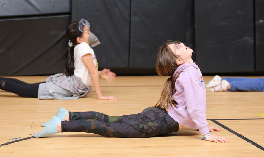 girls doing yoga