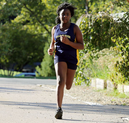 Girl running cross country