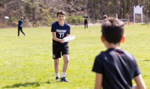 boy holding a frisbee