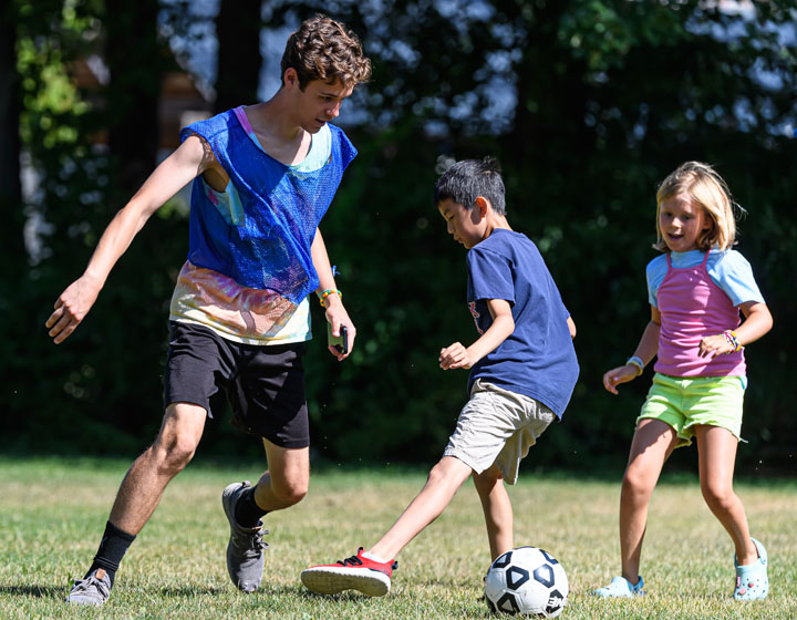 children playing soccer