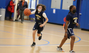 girl playing basketball 