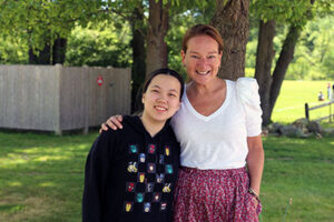 Two women standing together