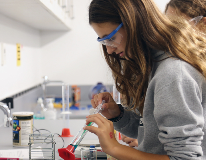 girl doing science