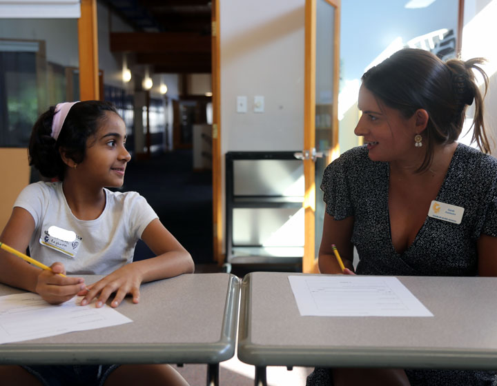 Student and teacher in classroom