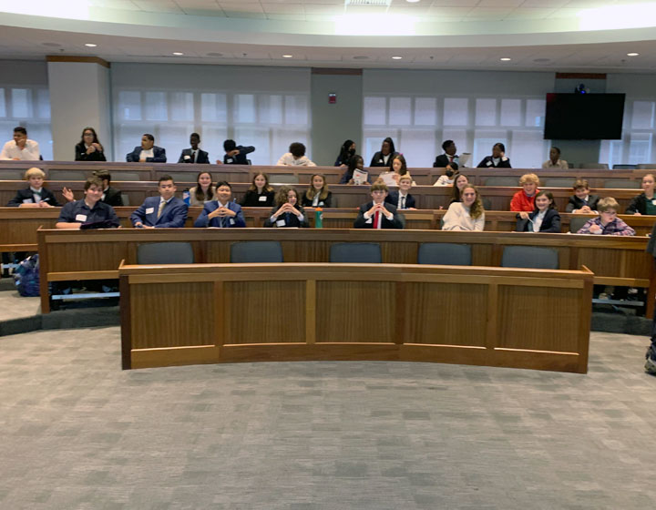 Students sitting in courtroom