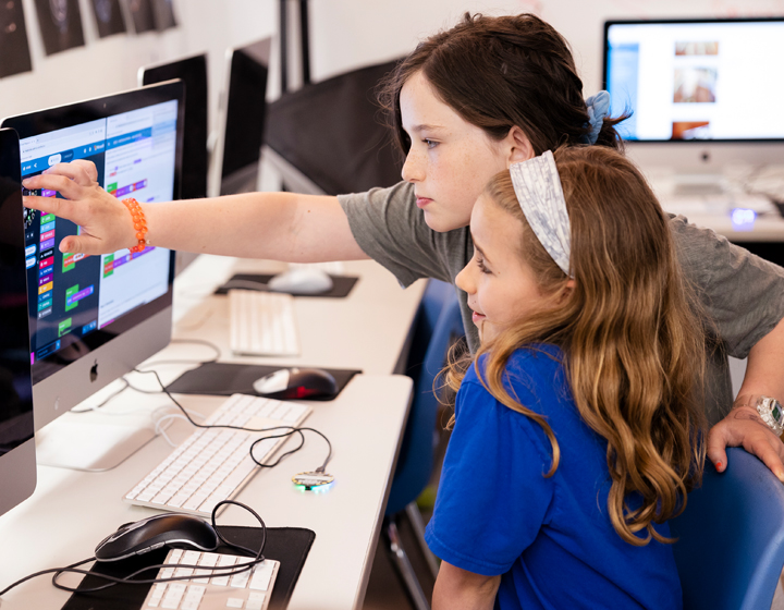 two girls at computer