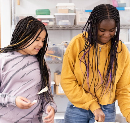 Girls working in art class