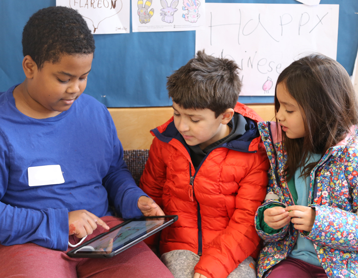 Three students working together