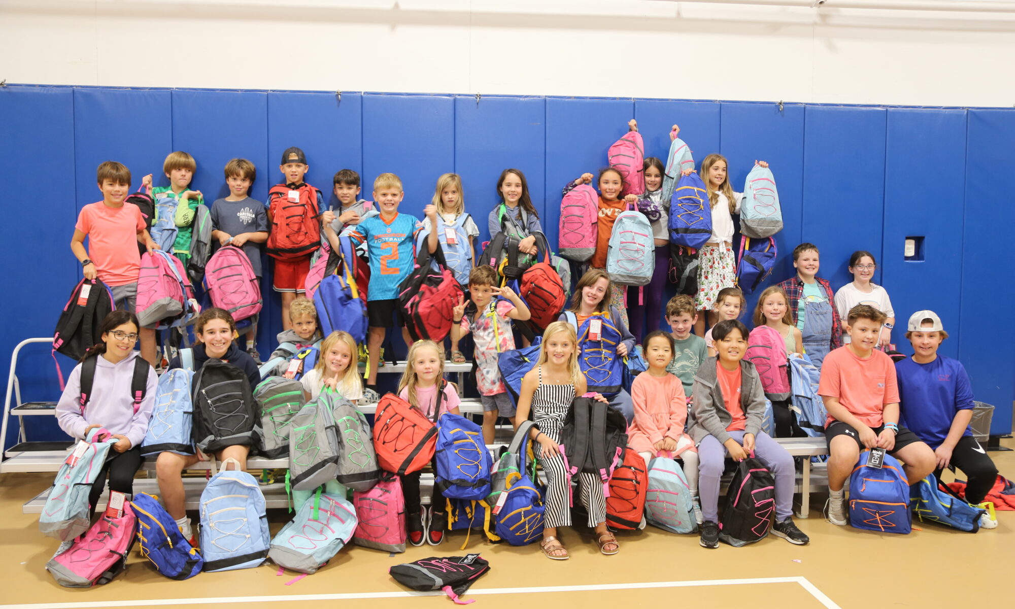 Students with packed backpacks