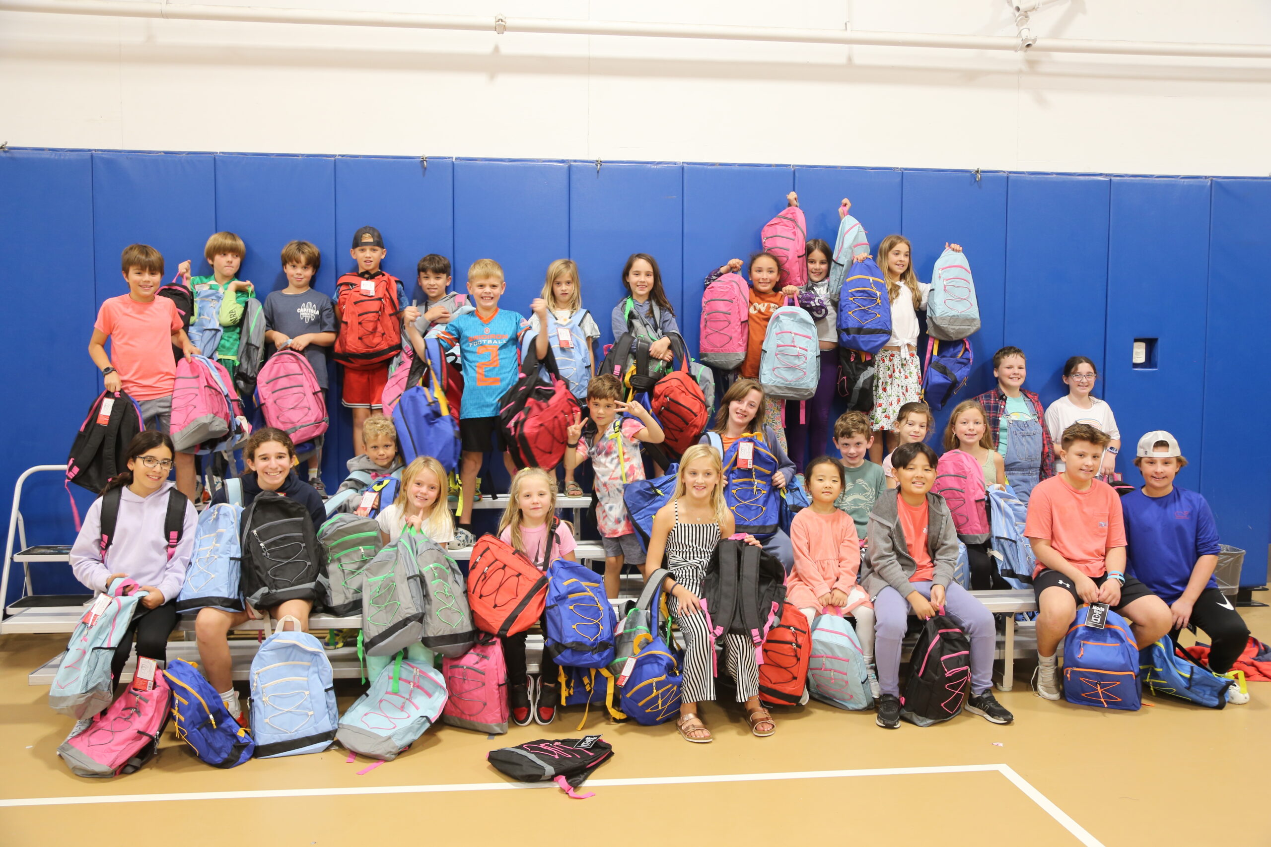 Students with packed backpacks