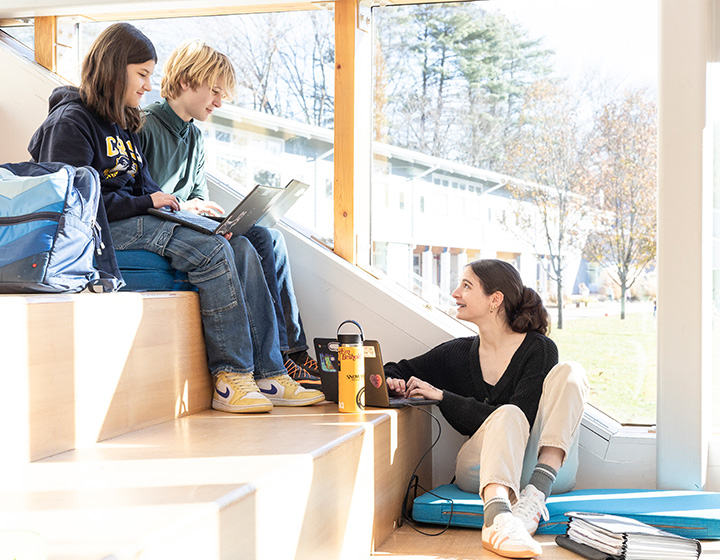 students learning on stairs